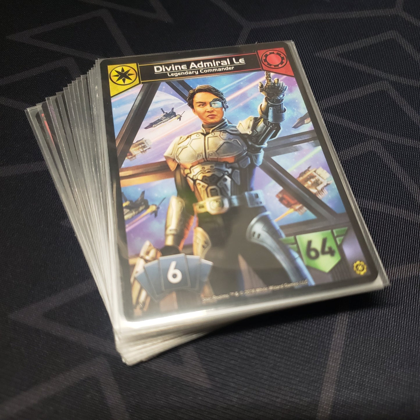 Image shows the cards for the Command Deck: The Alignment expansion for the card game Star Realms fanned out in a stack