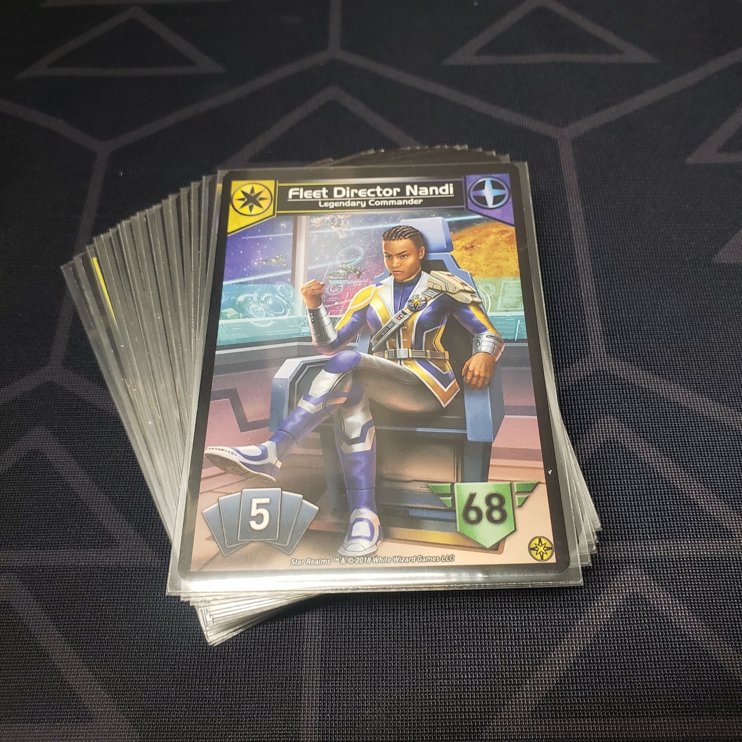 Image shows the cards for the Command Deck: The Alliance expansion for the card game Star Realms fanned out in a stack