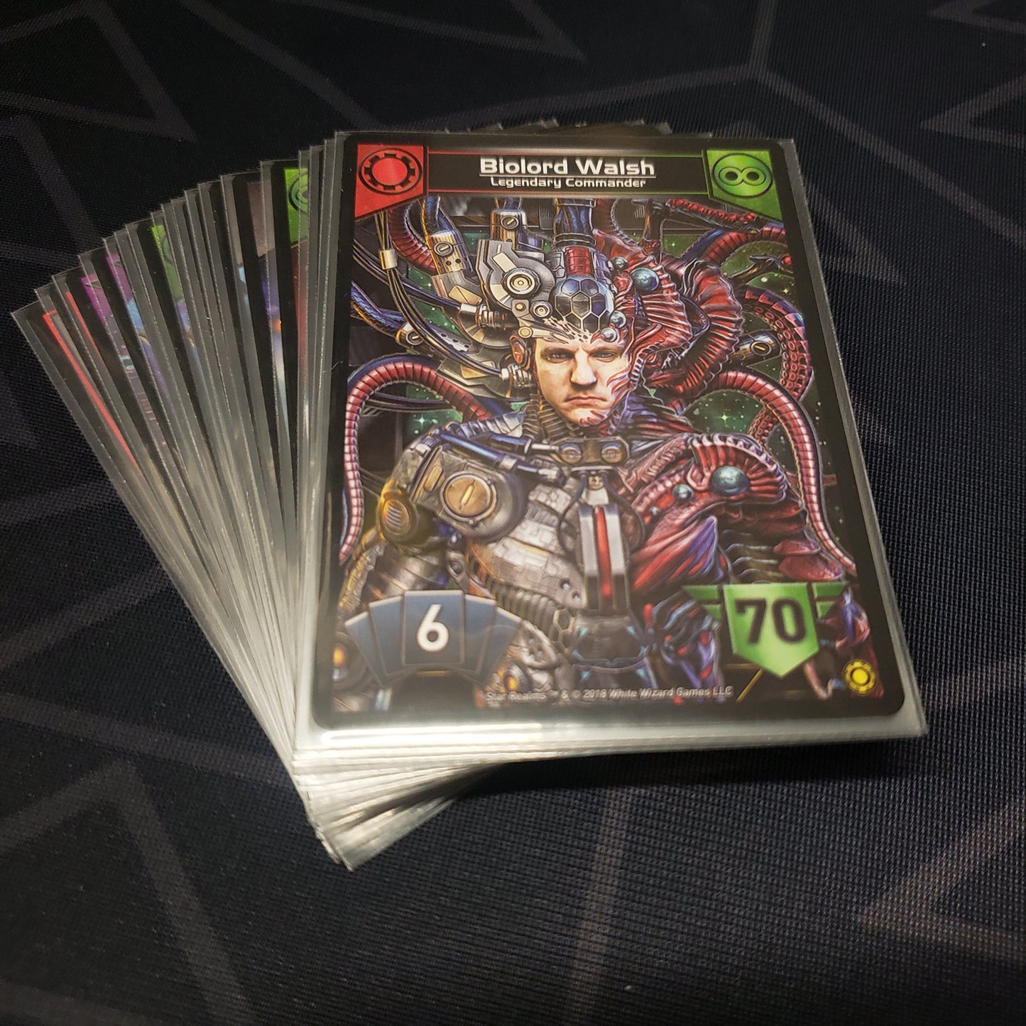 Image shows the cards for the Command Deck: The Unity expansion for the card game Star Realms fanned out in a stack