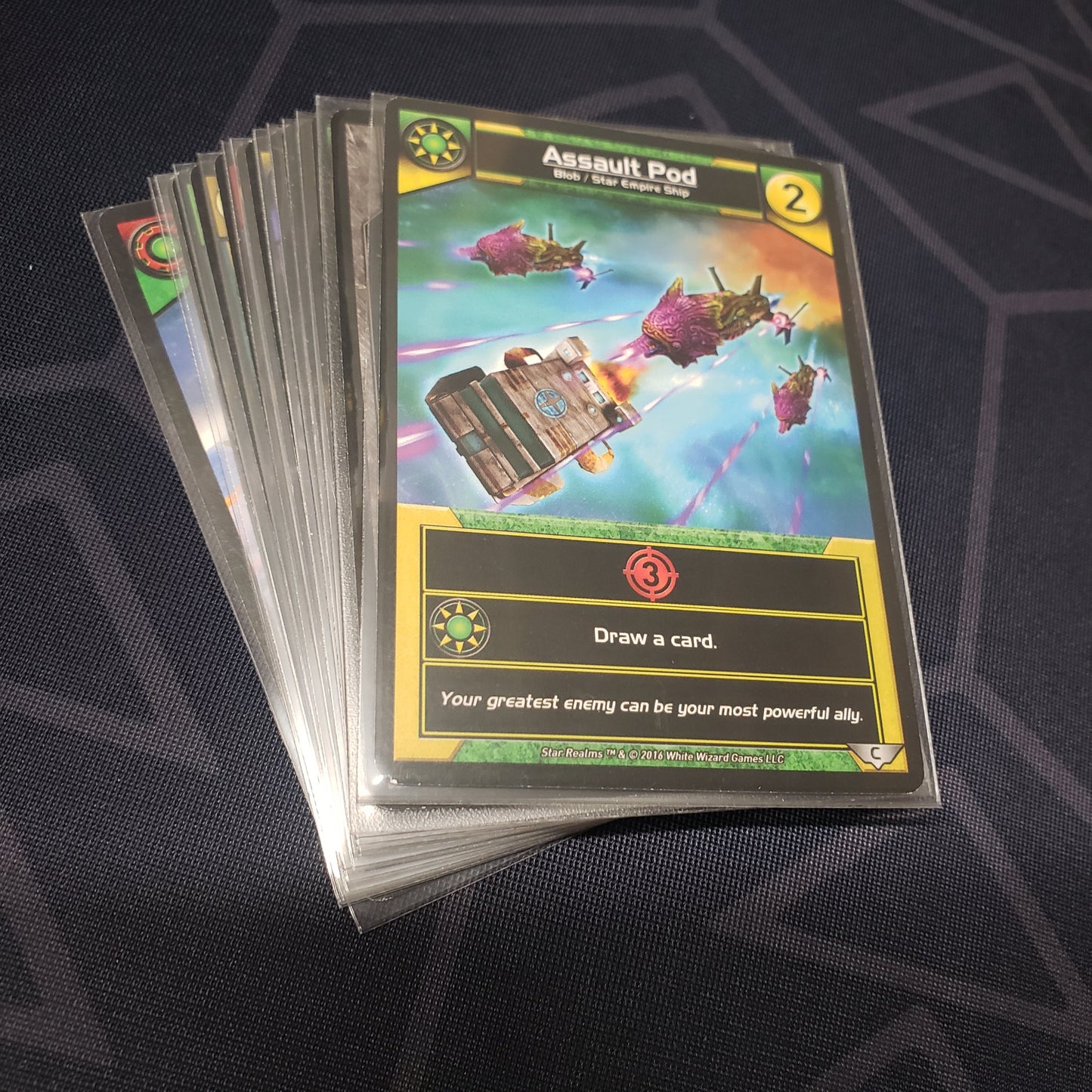 Image shows the cards for the United: Command expansion for the card game Star Realms fanned out in a stack