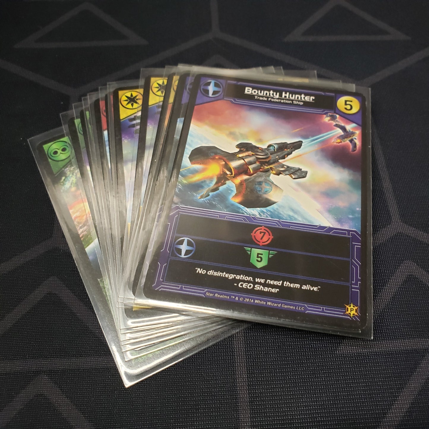 Image shows the fanned out cards of the Year Two Promos expansion for the card game Star Realms