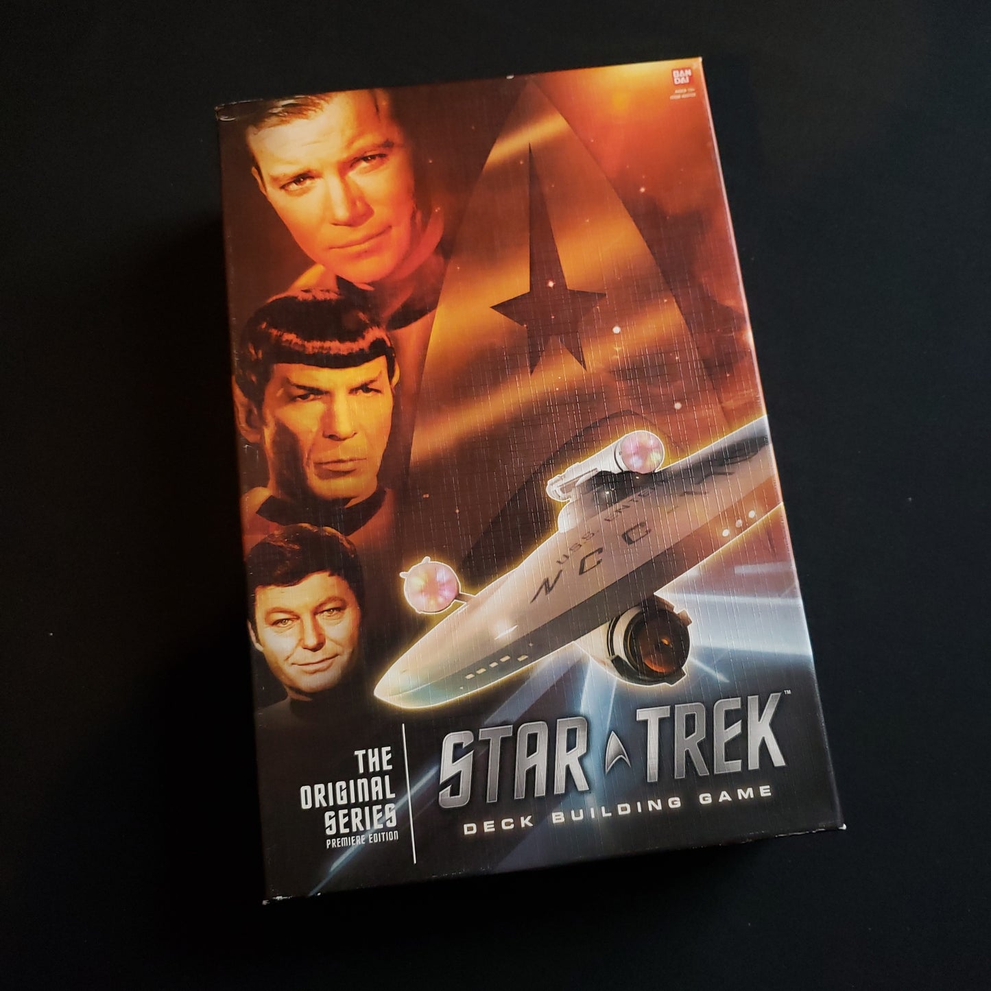 Image shows the front cover of the box of the Original Series set for the Star Trek Deckbuilding Game