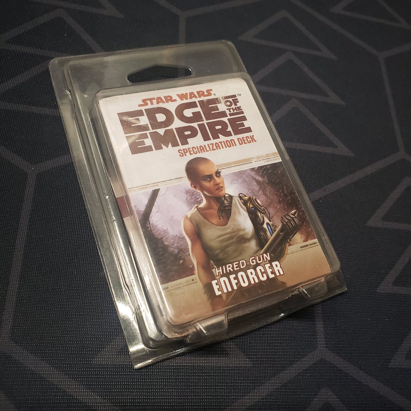 Image shows the front of the clamshell packaging for the Hired Gun Enforcer Deck for the roleplaying game Star Wars: Edge of the Empire