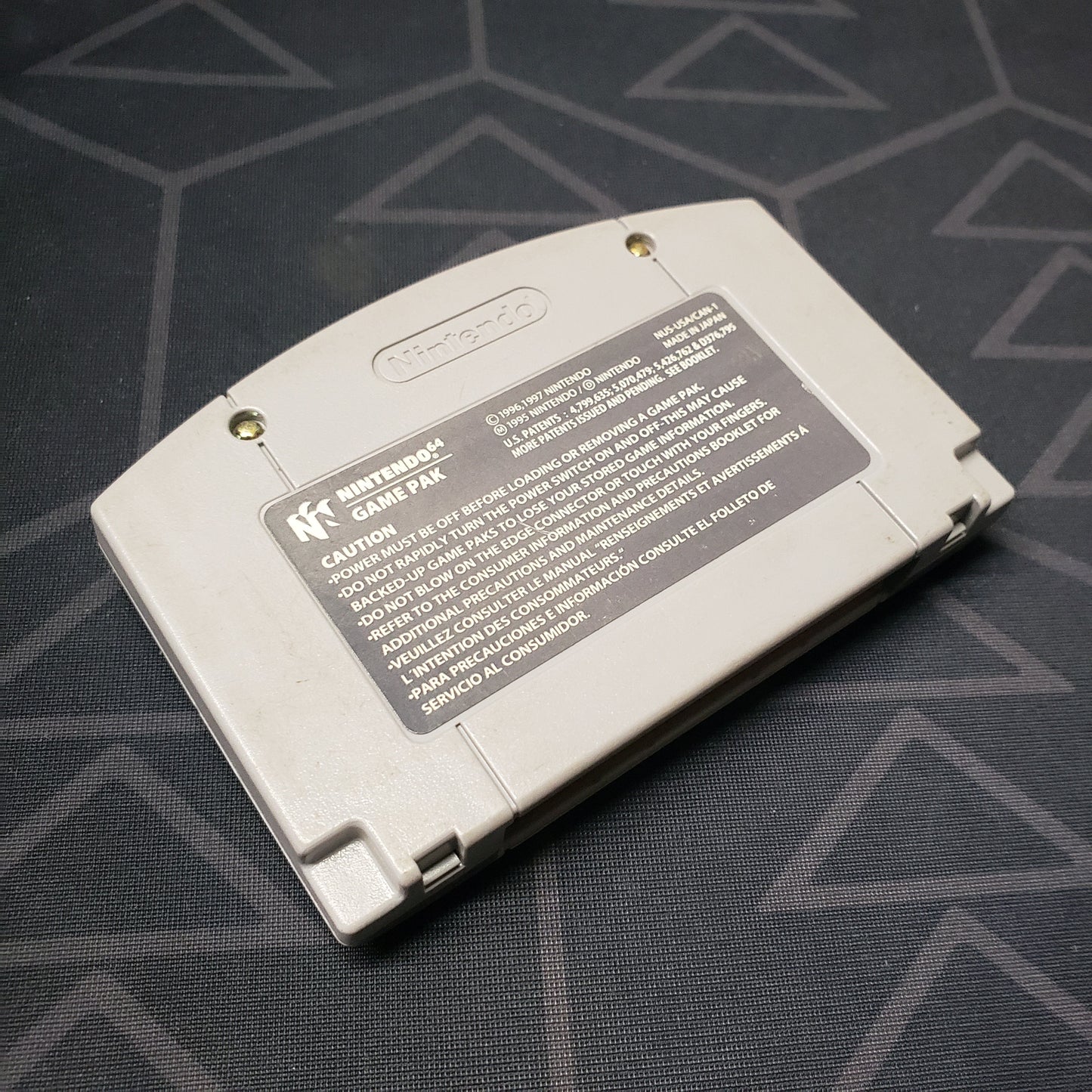 Image shows the back of the cartridge for the video game Star Wars: Rogue Squadron for the Nintendo 64
