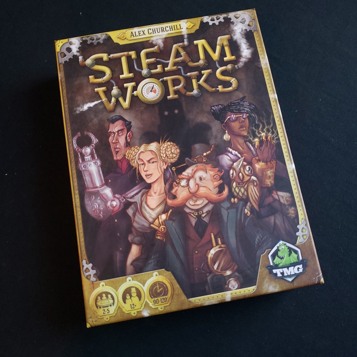 Image shows the front cover of the box of the Steam Works board game