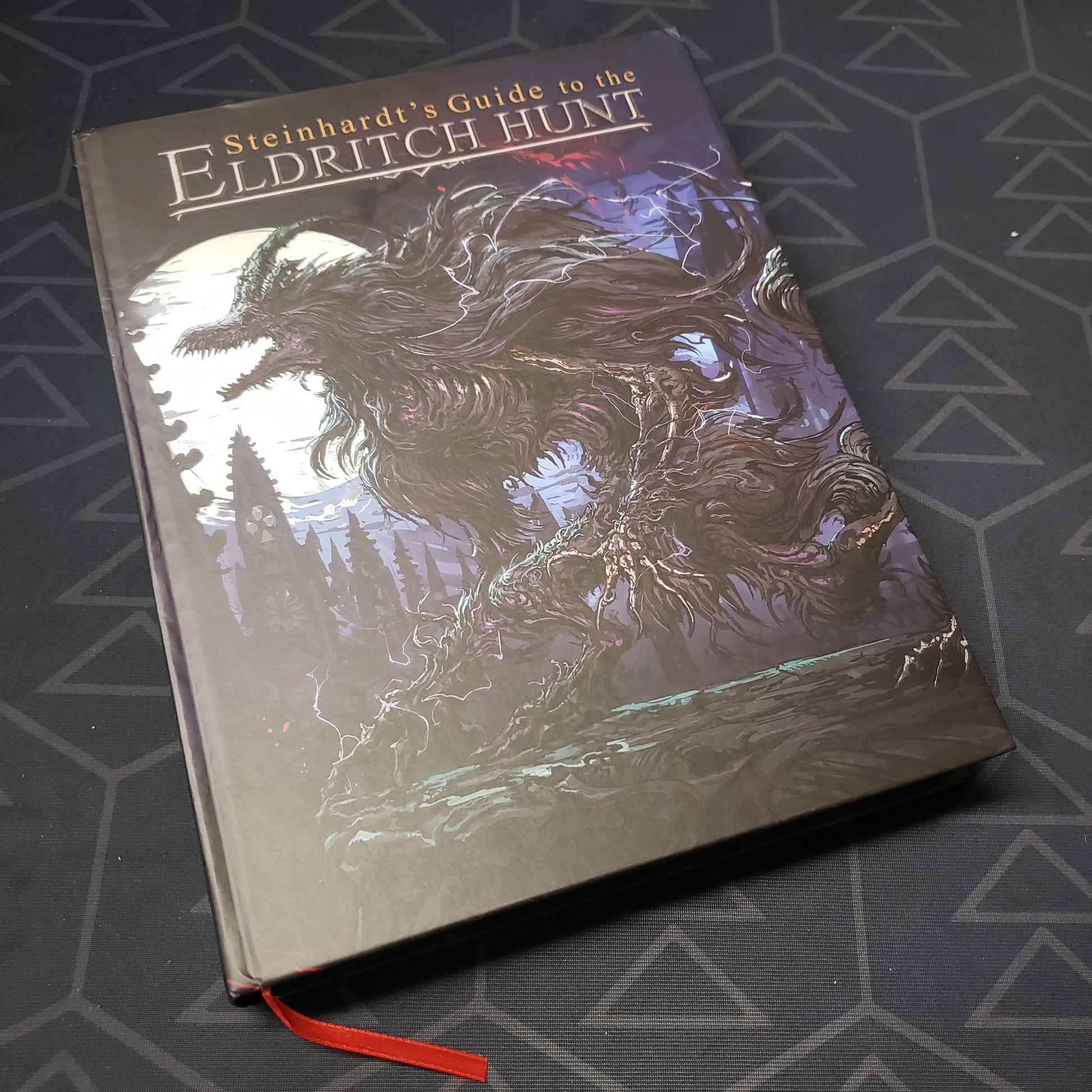 Image shows the front cover of the Steinhardt's Guide to the Eldritch Hunt (5E) roleplaying game book