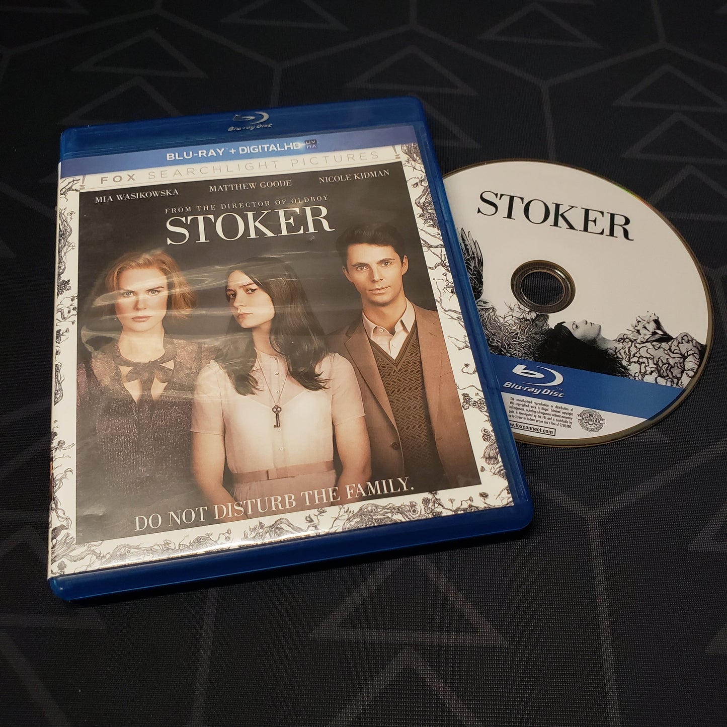 Image shows the case & disc for the movie Stoker on Blu-Ray