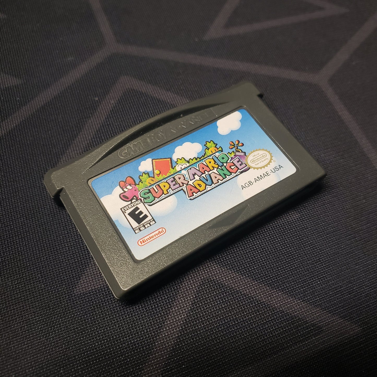 Image shows the front of the cartridge for the video game Super Mario Advance for Nintendo Game Boy Advance