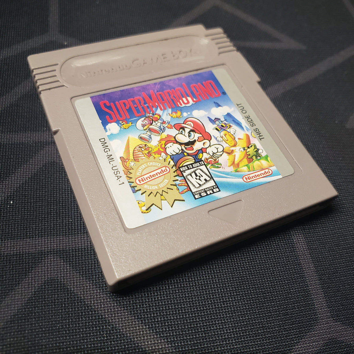 Image shows the front of the cartridge for the video game Super Mario Land for Nintendo Game Boy