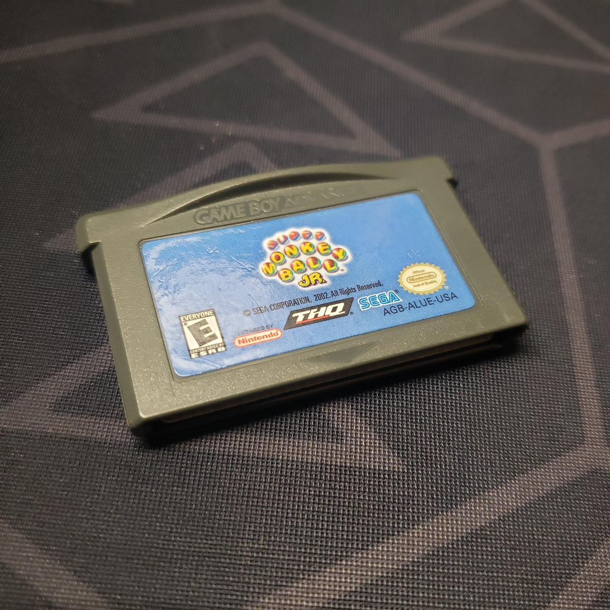 Image shows the front of the cartridge for the video game Super Monkey Ball Jr. for Nintendo Game Boy Advance