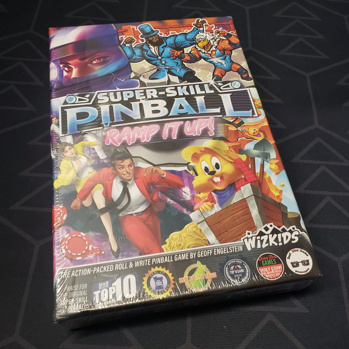 Image shows the front cover of the box of the Super-Skill Pinball: Ramp It Up! board game