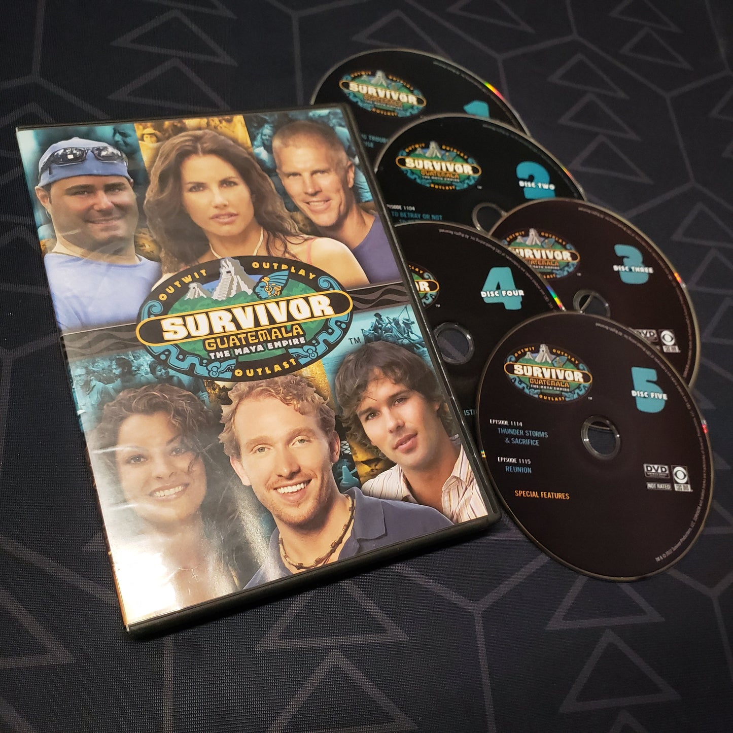 Image shows the case & five discs for the Season 11: Guatemala set of Survivor on DVD
