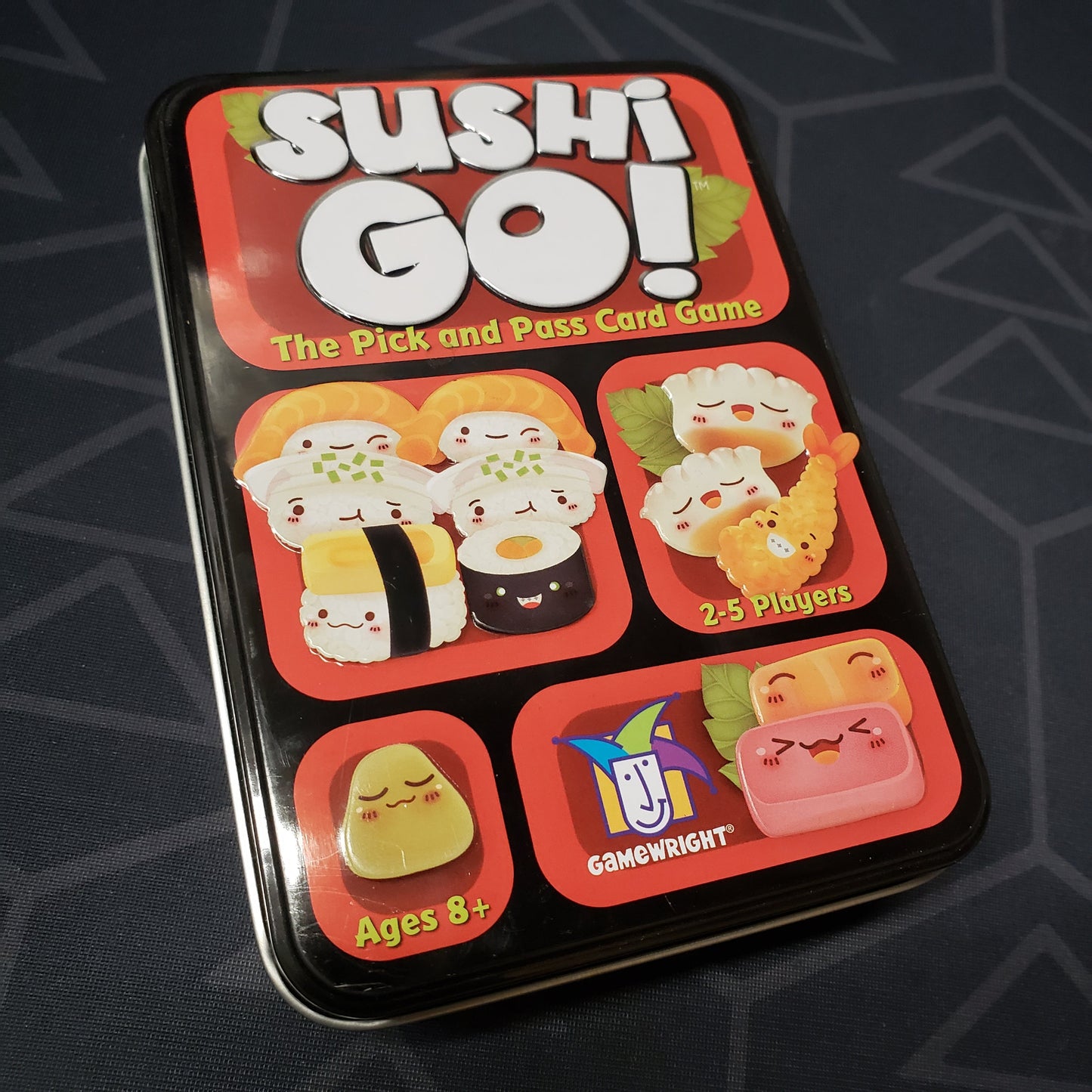 Image shows the front cover of the box for the Sushi Go! card game