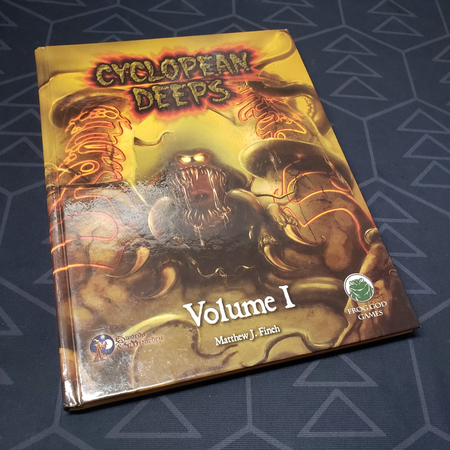 Image shows the front cover of the Cyclopean Deeps: Volume I book for the roleplaying game Swords & Wizardry