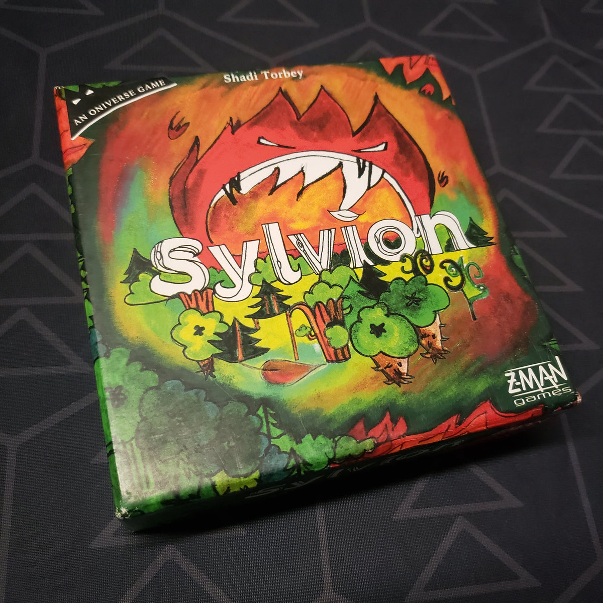 Image shows the front cover of the box for the Sylvion card game