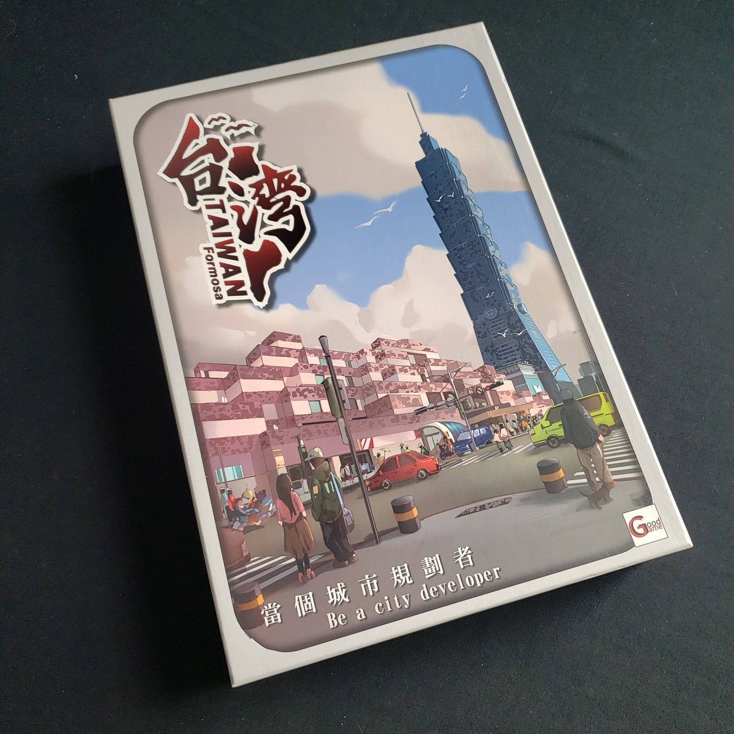 Image shows the front cover of the box of the Taiwan Formosa board game