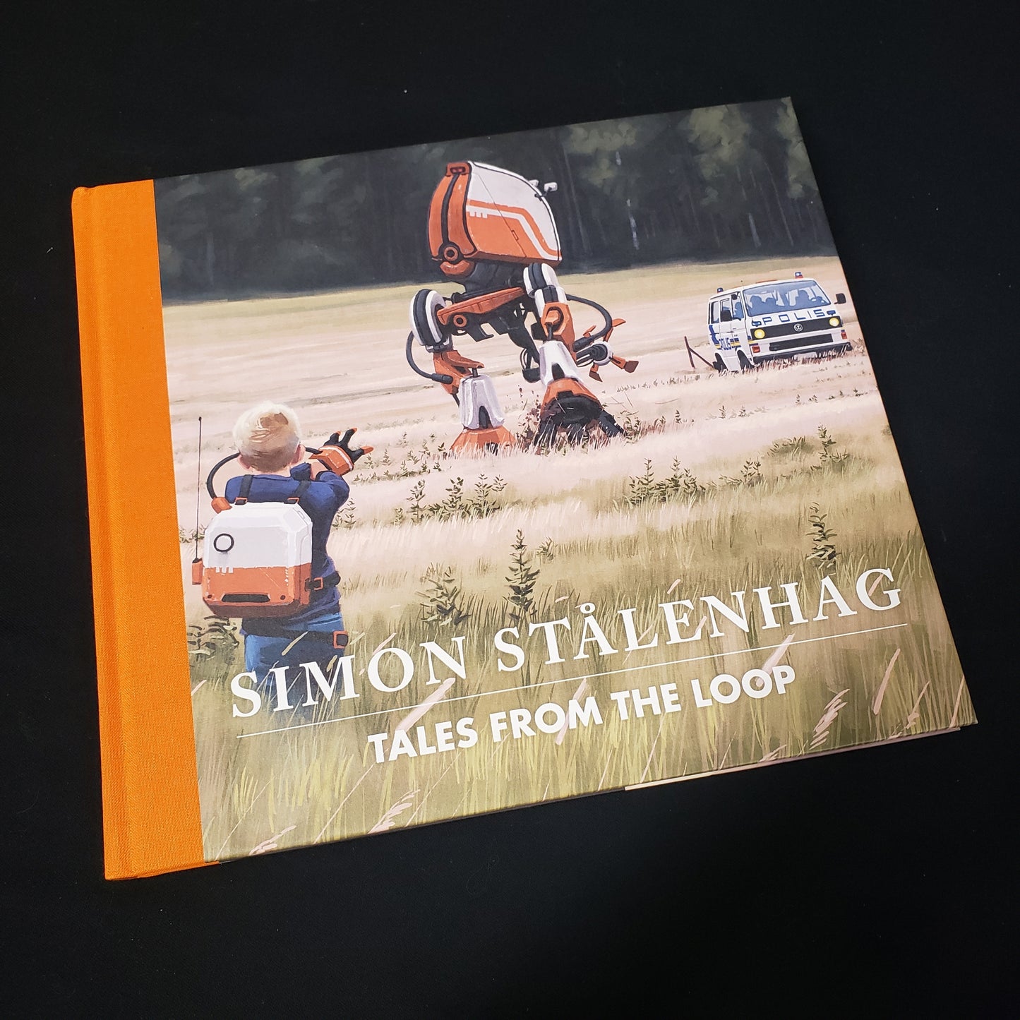 Image shows the front cover of the art book for the Tales from the Loop roleplaying game