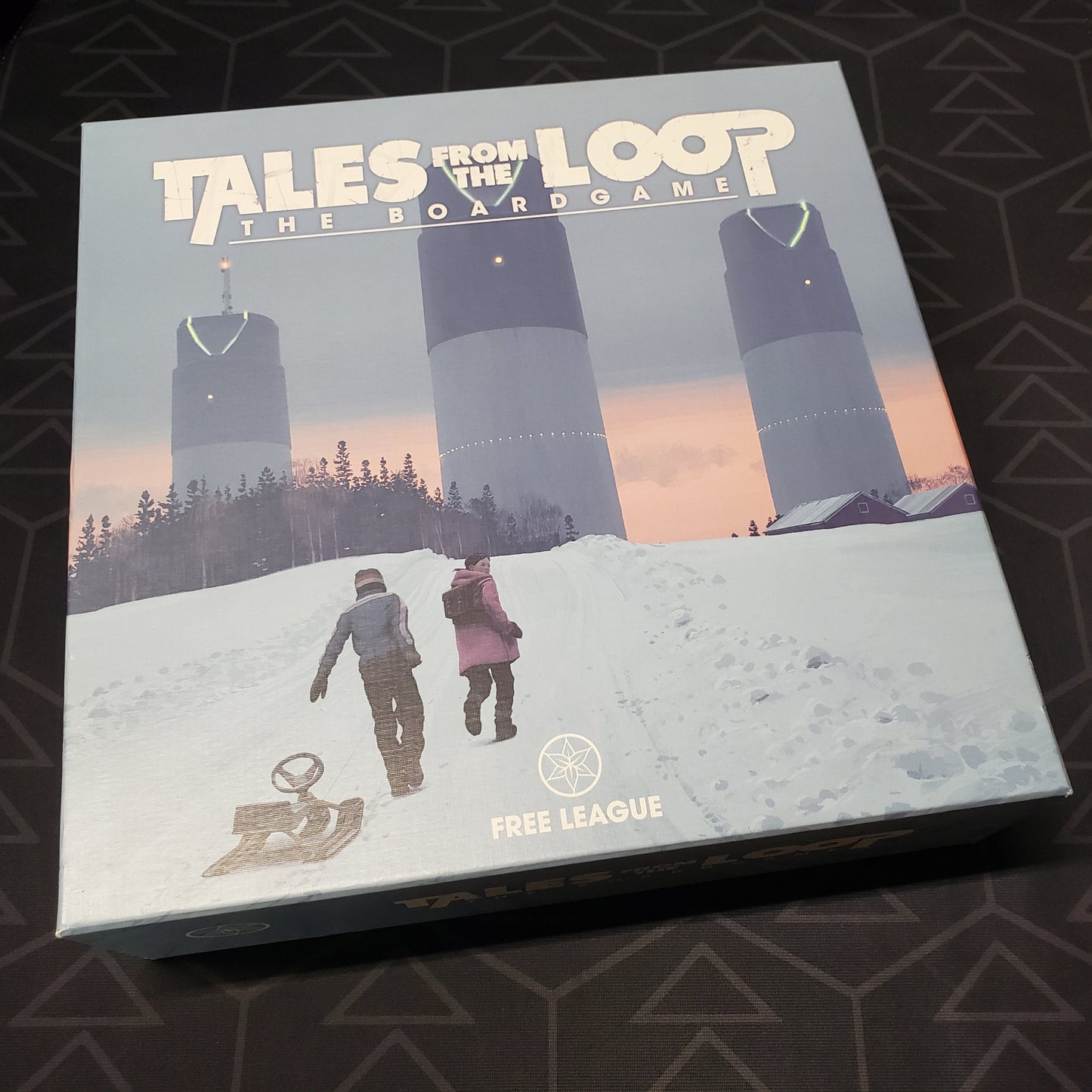 Image shows the front cover of the box for Tales from the Loop: The Board Game