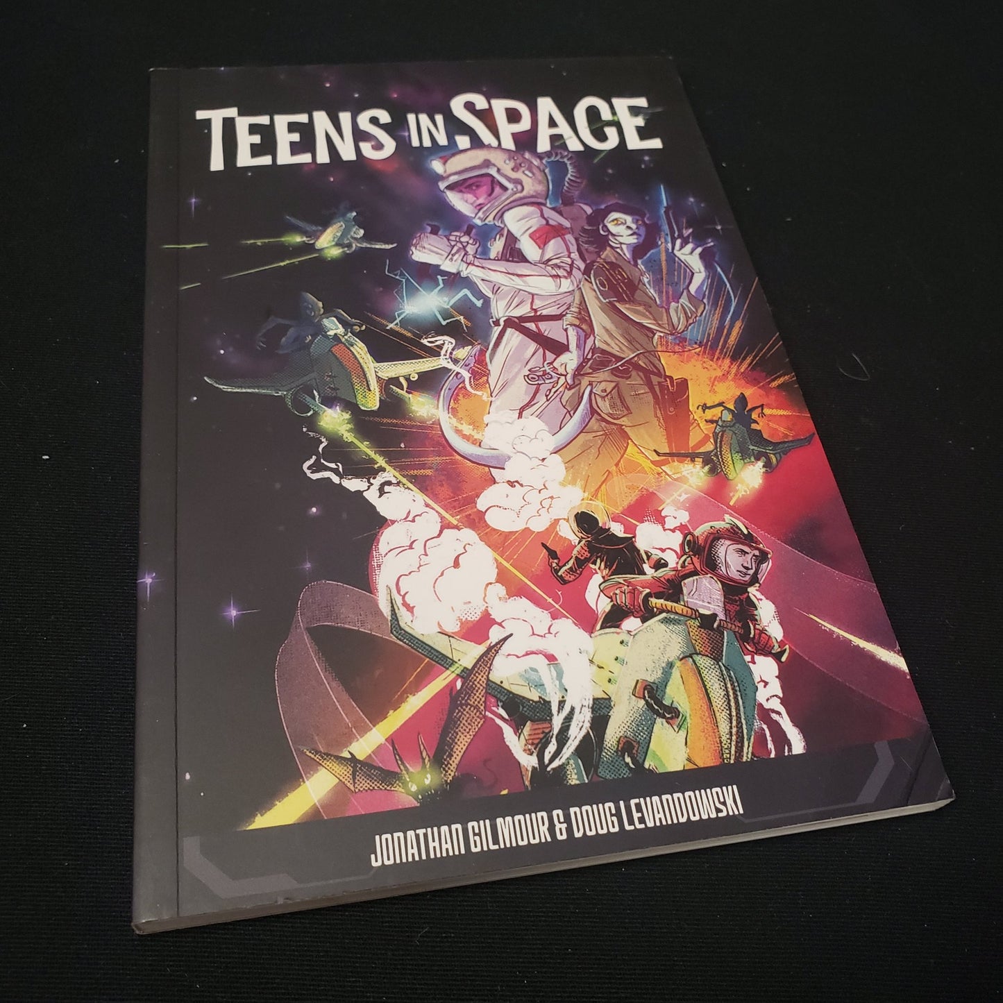 Image shows the front cover of the Teens in Space roleplaying game book