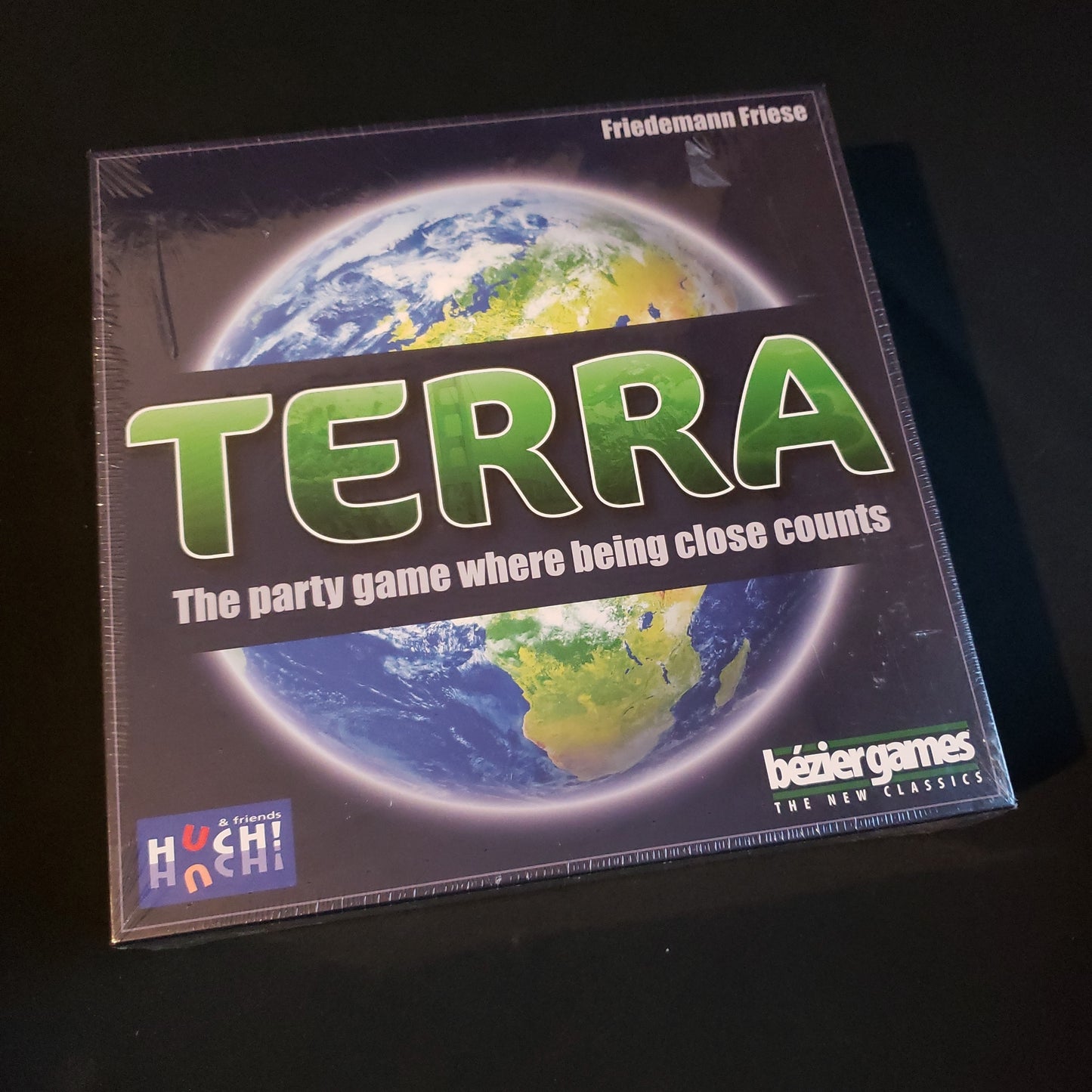 Image shows the front cover of the box of the Terra board game