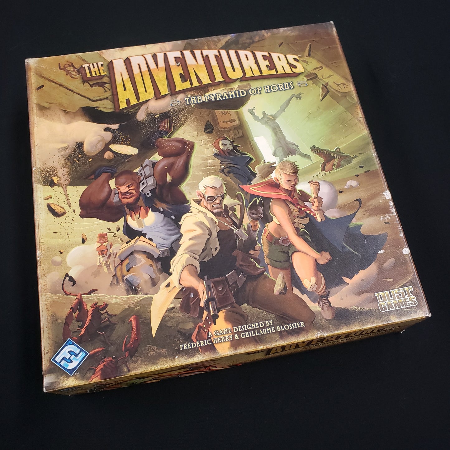 Image shows the front cover of the box of the Adventurers: Pyramid of Horus board game