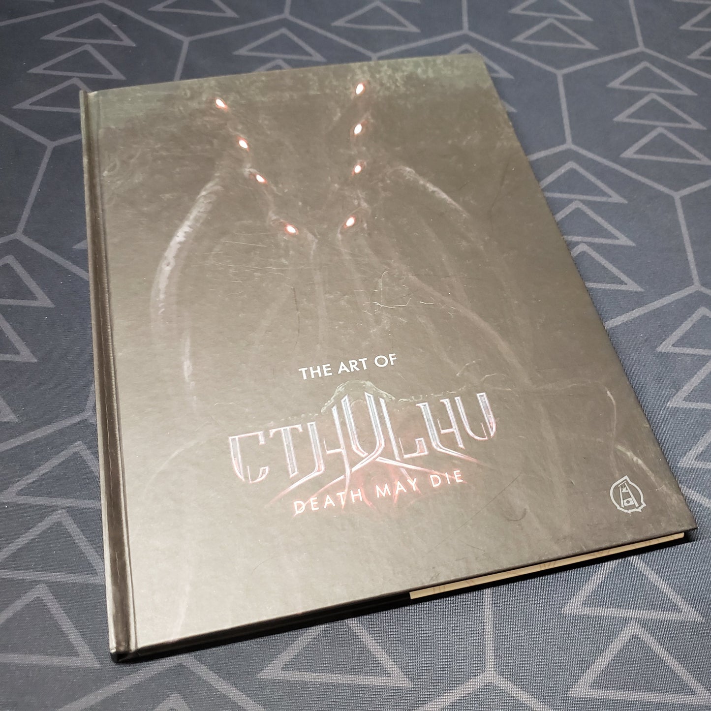 Image shows the front cover of the Art of Cthulhu: Death My Die art book