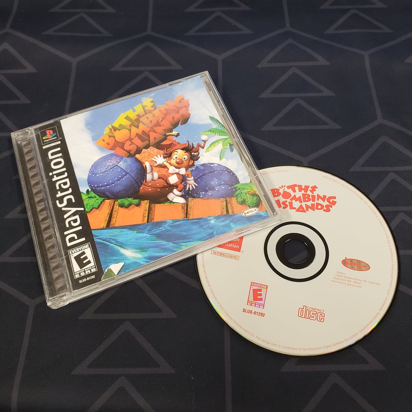 Image shows the jewel case with manual and disc for the video game The Bombing Islands for Playstation 1