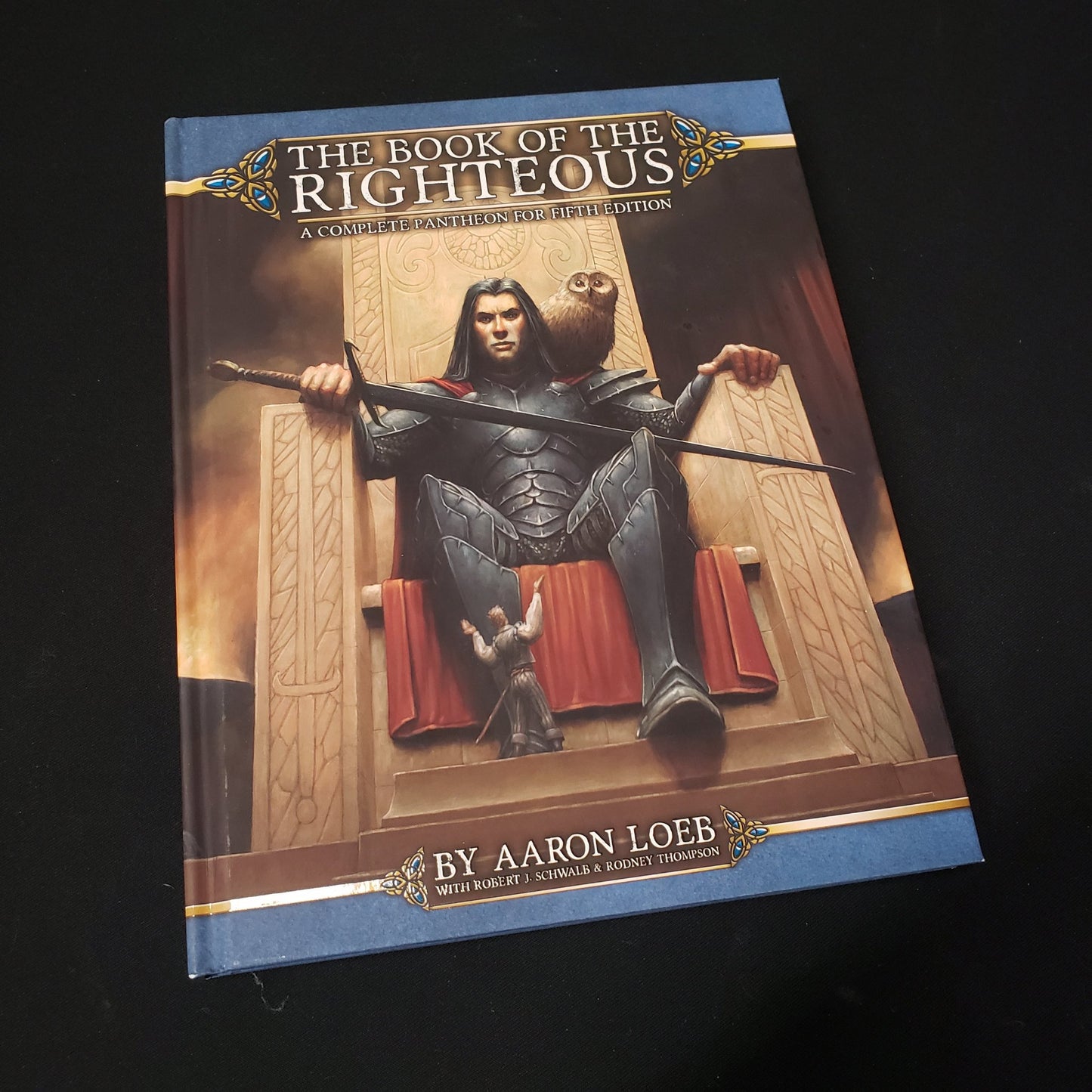 Image shows the front cover of the Book of the Righteous 5E roleplaying game book