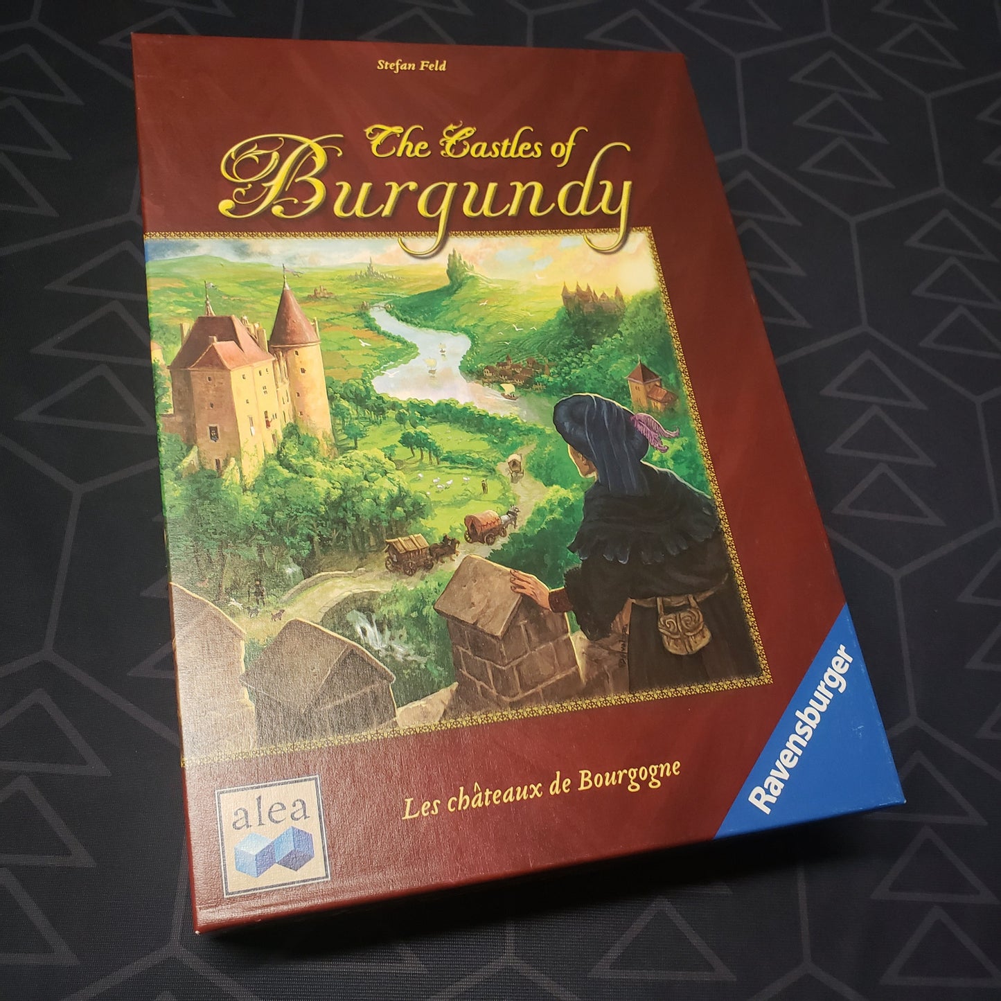Image shows the front cover of the box of the Castles of Burgundy board game