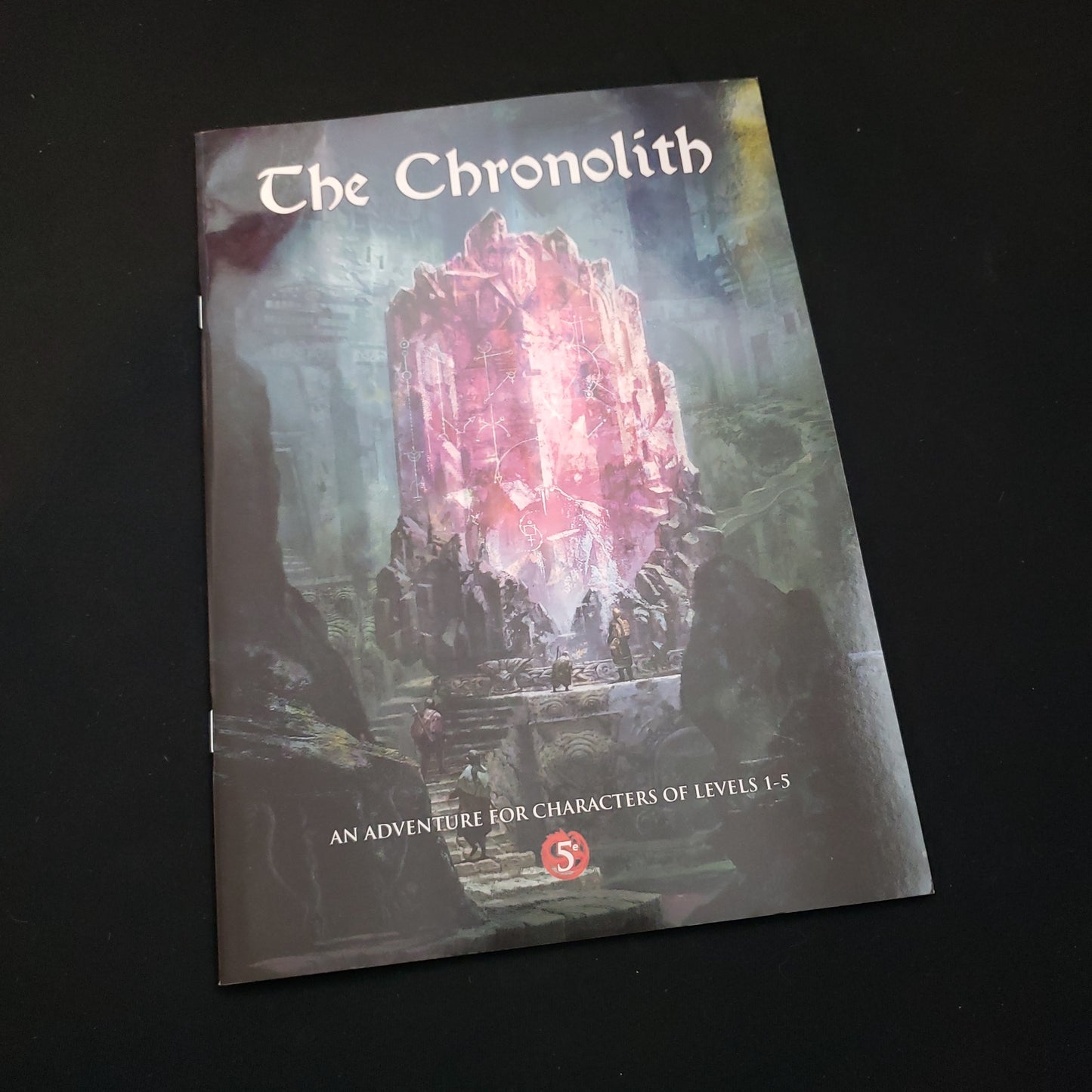 Image shows the front cover of the Chronolith roleplaying game book