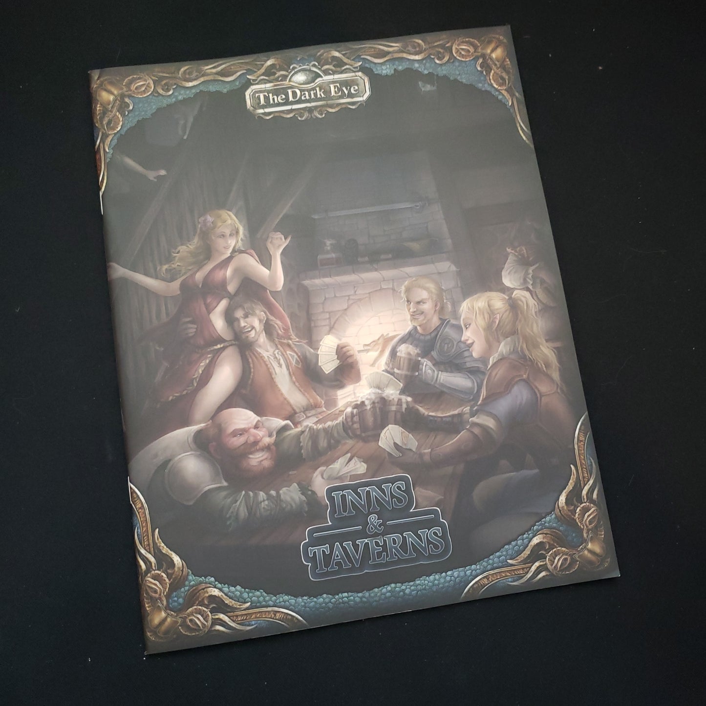 Image shows the front cover of the Inns & Taverns book for the Dark Eye roleplaying game