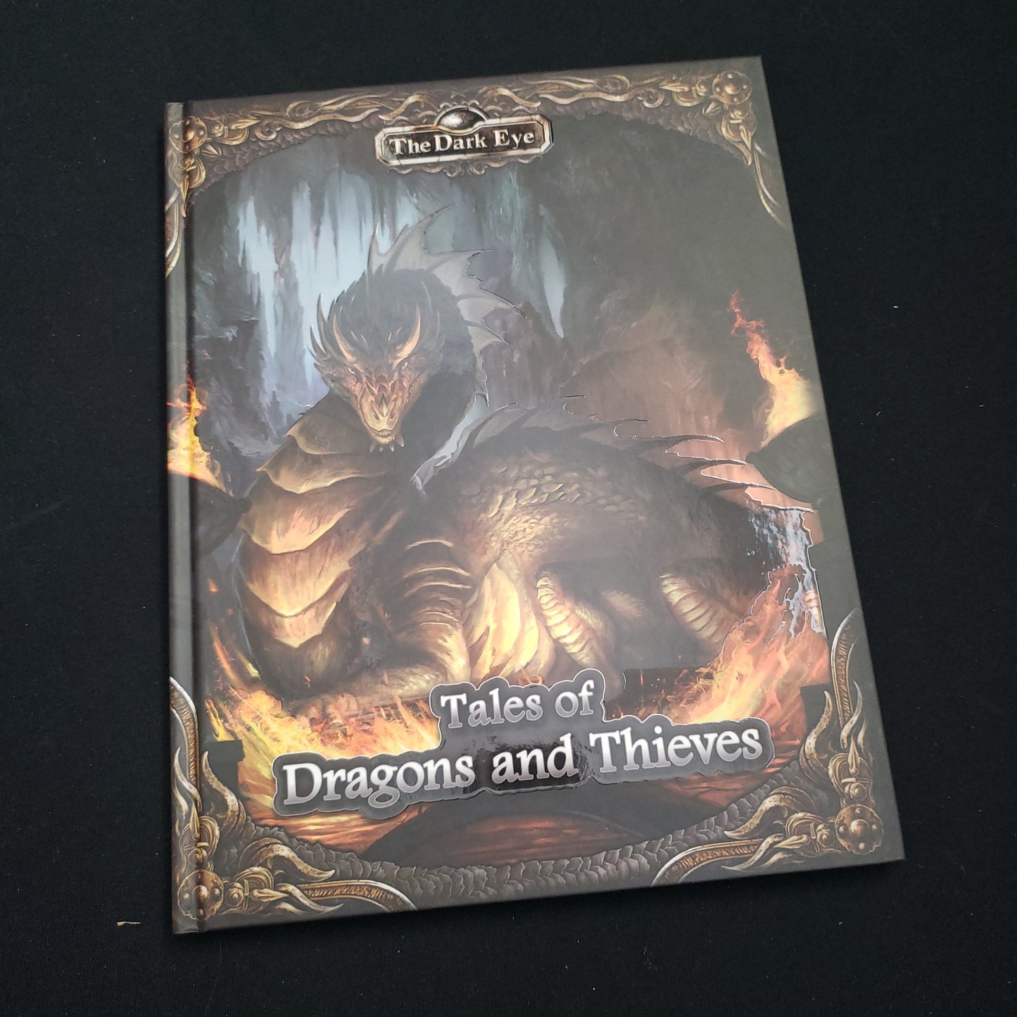 Image shows the front cover of the Tales of Dragons and Thieves book for the Dark Eye roleplaying game