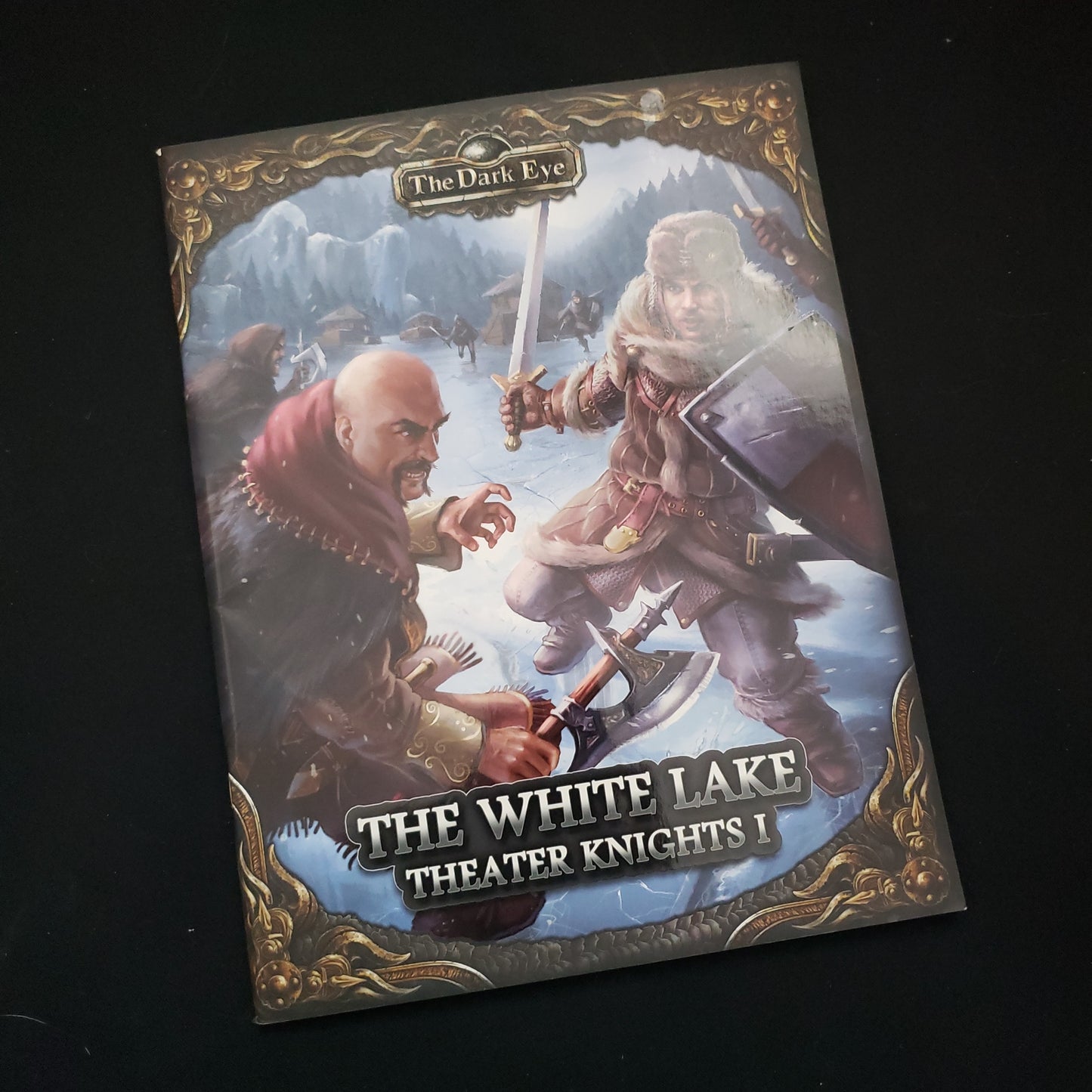 Image shows the front cover of the Theater Knights I: The White Lake book for the Dark Eye roleplaying game