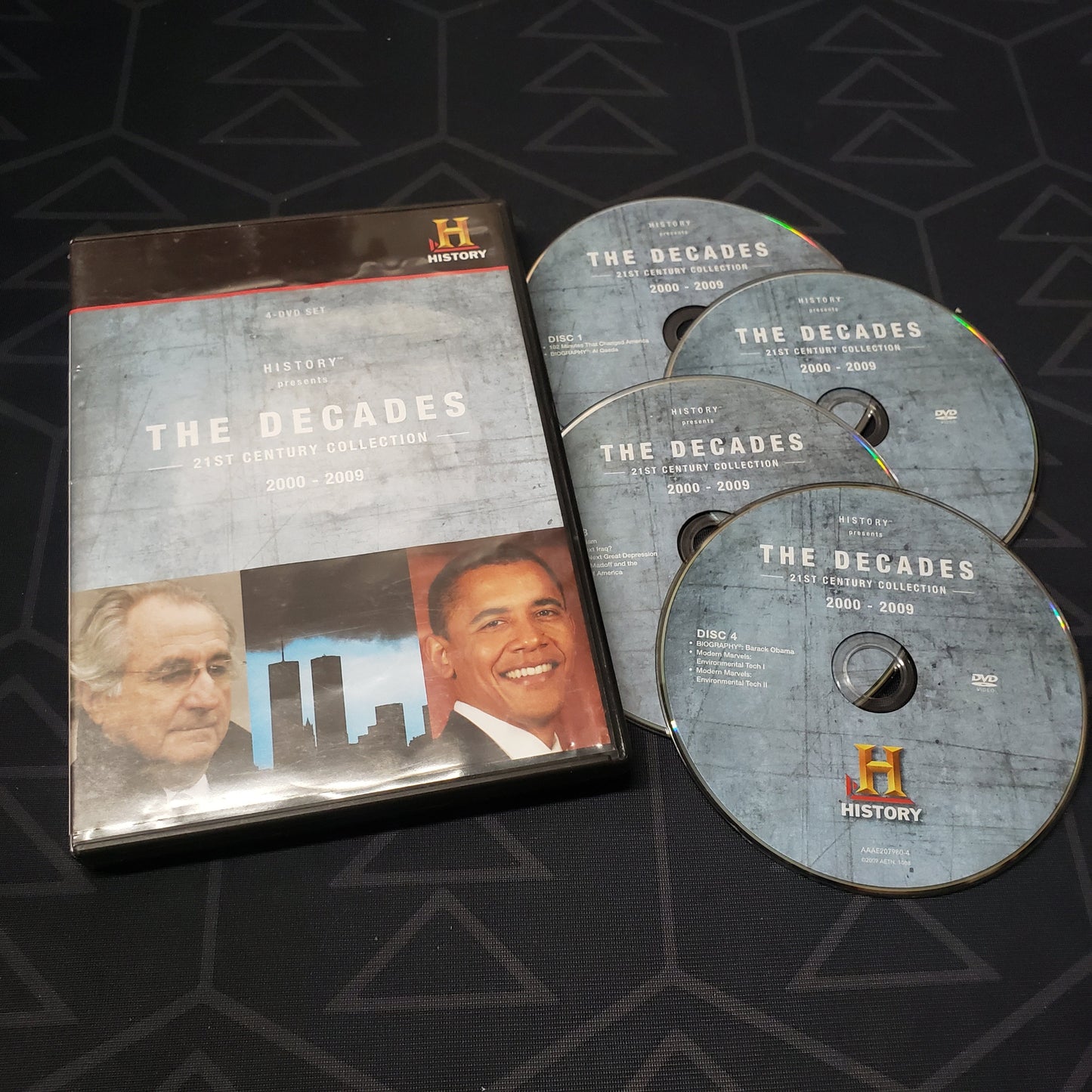 Image shows the case & four discs for the History Channel collection The Decades: 2000-2009 on DVD