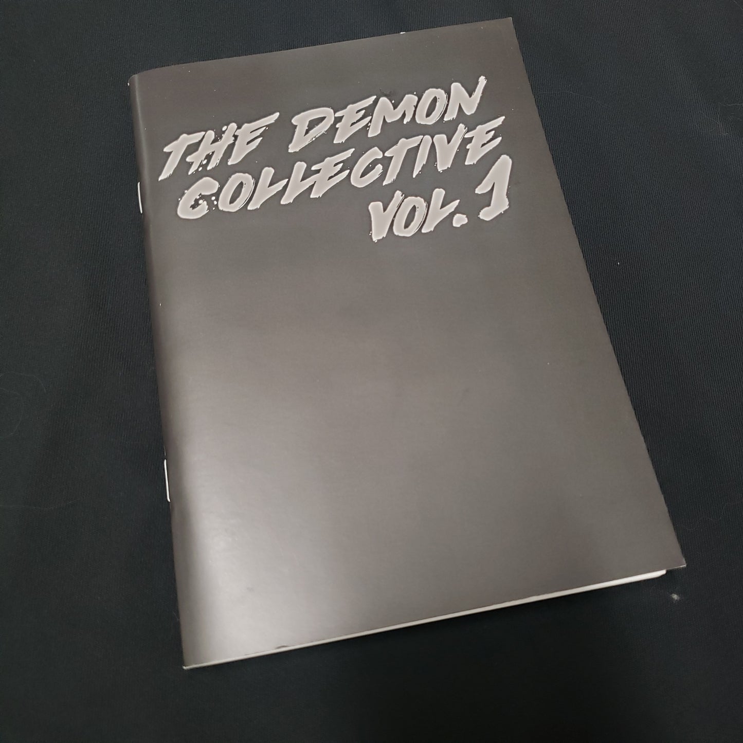 Image shows the front cover of the Demon Collective Vol. 1 roleplaying game book