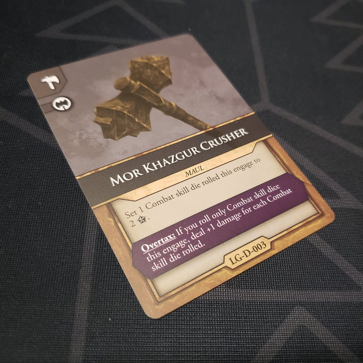 Image shows the front of the Mor Khazgur Crusher GenCon promo card for the board game The Elder Scrolls: Betrayal of the Second Era