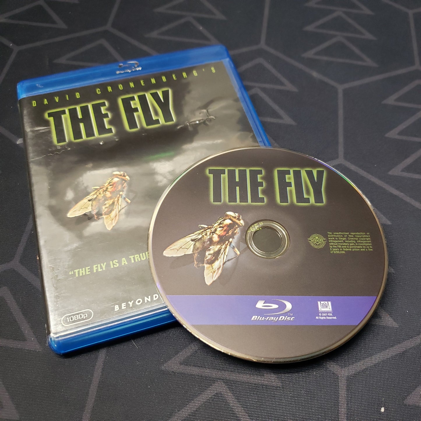Image shows the case & disc for the movie The Fly on Blu-Ray