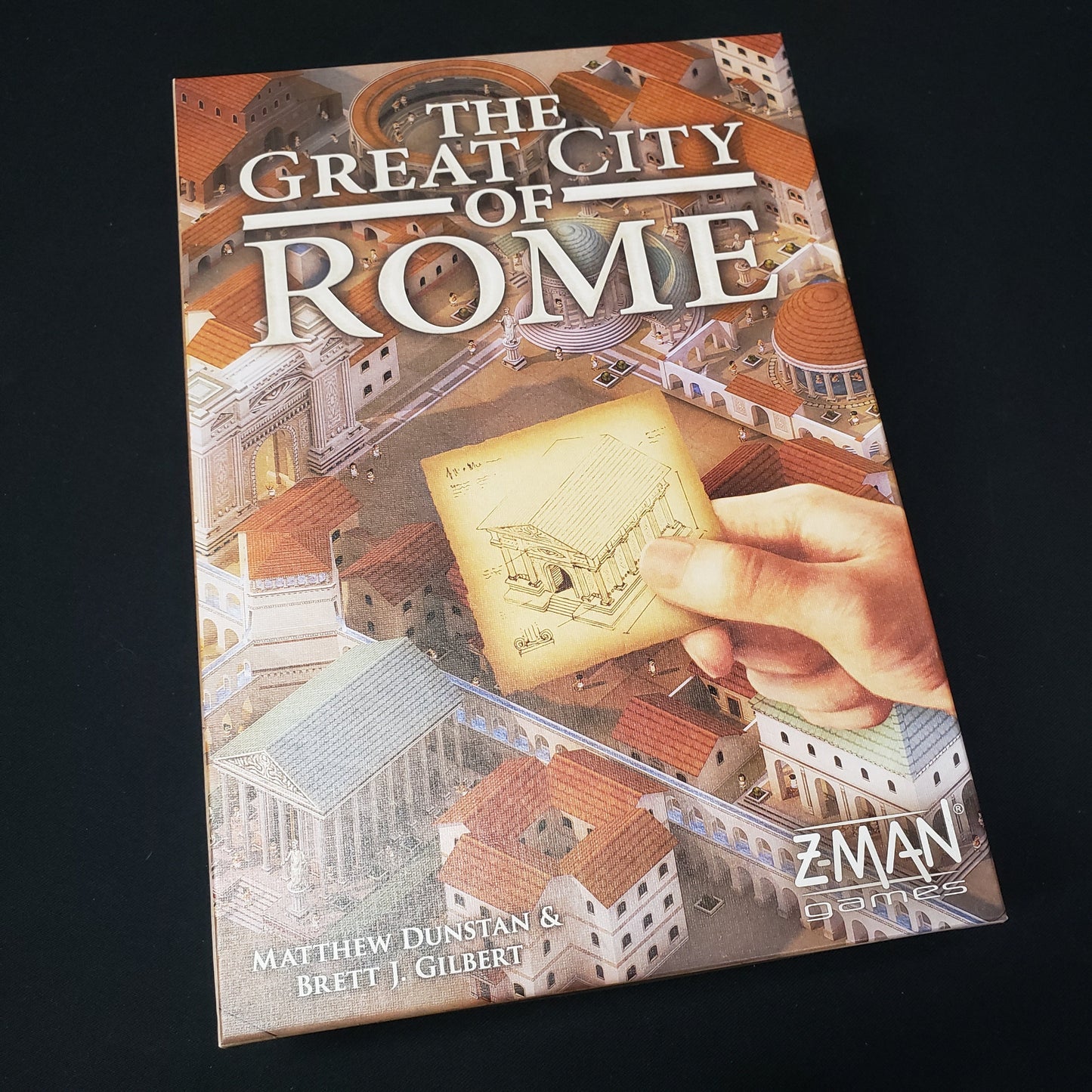 Image shows the front cover of the box of the Great City of Rome board game