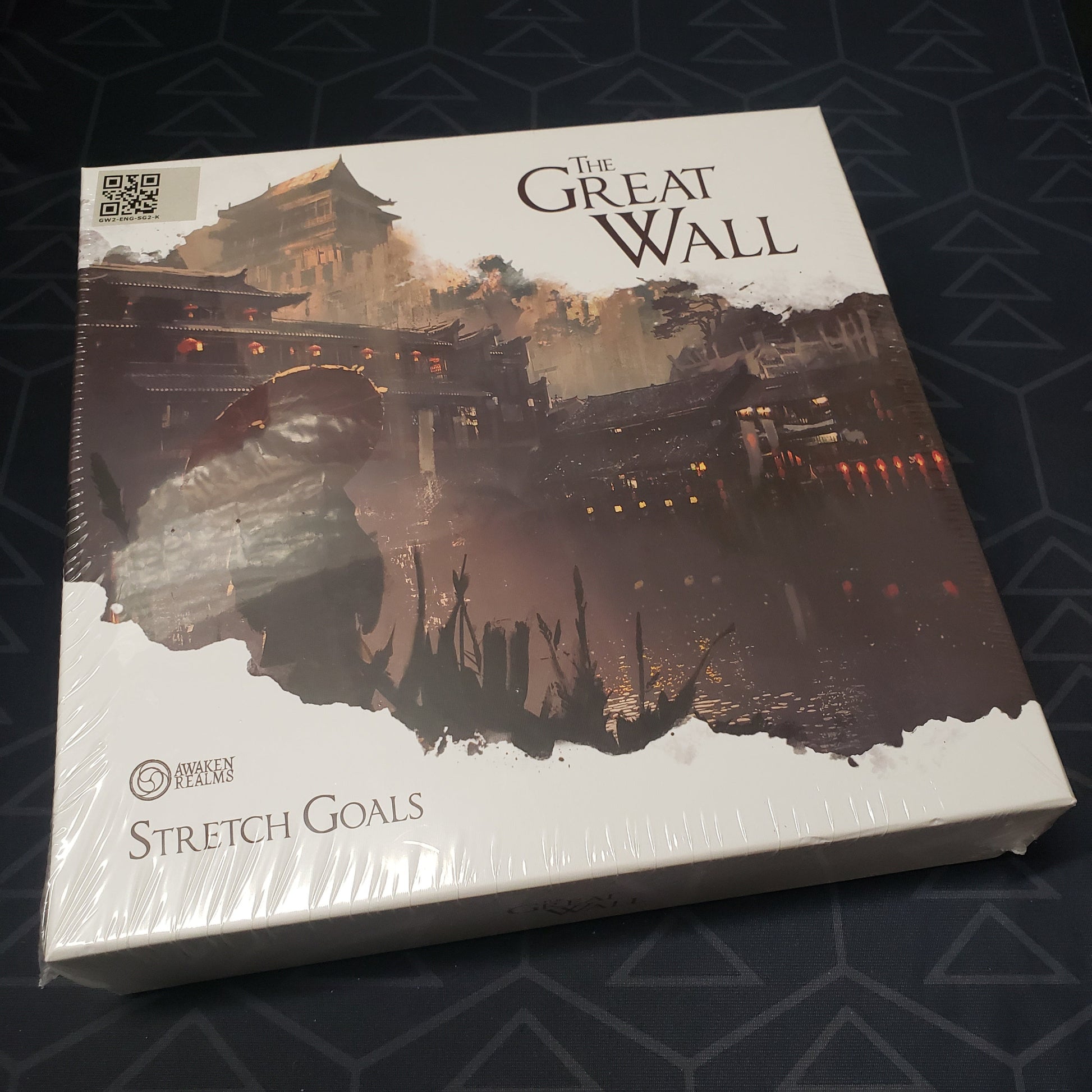 Image shows the front cover of the box of the Stretch Goals expansion for the board game The Great Wall
