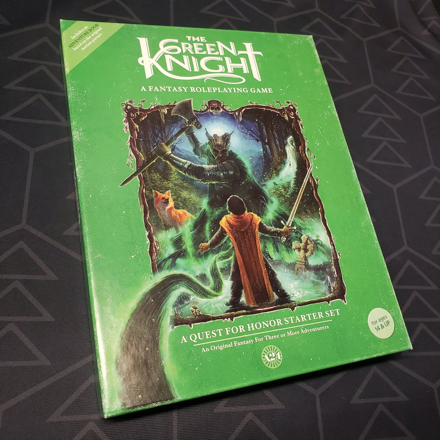 Image shows the front cover of the starter box for the roleplaying game The Green Knight