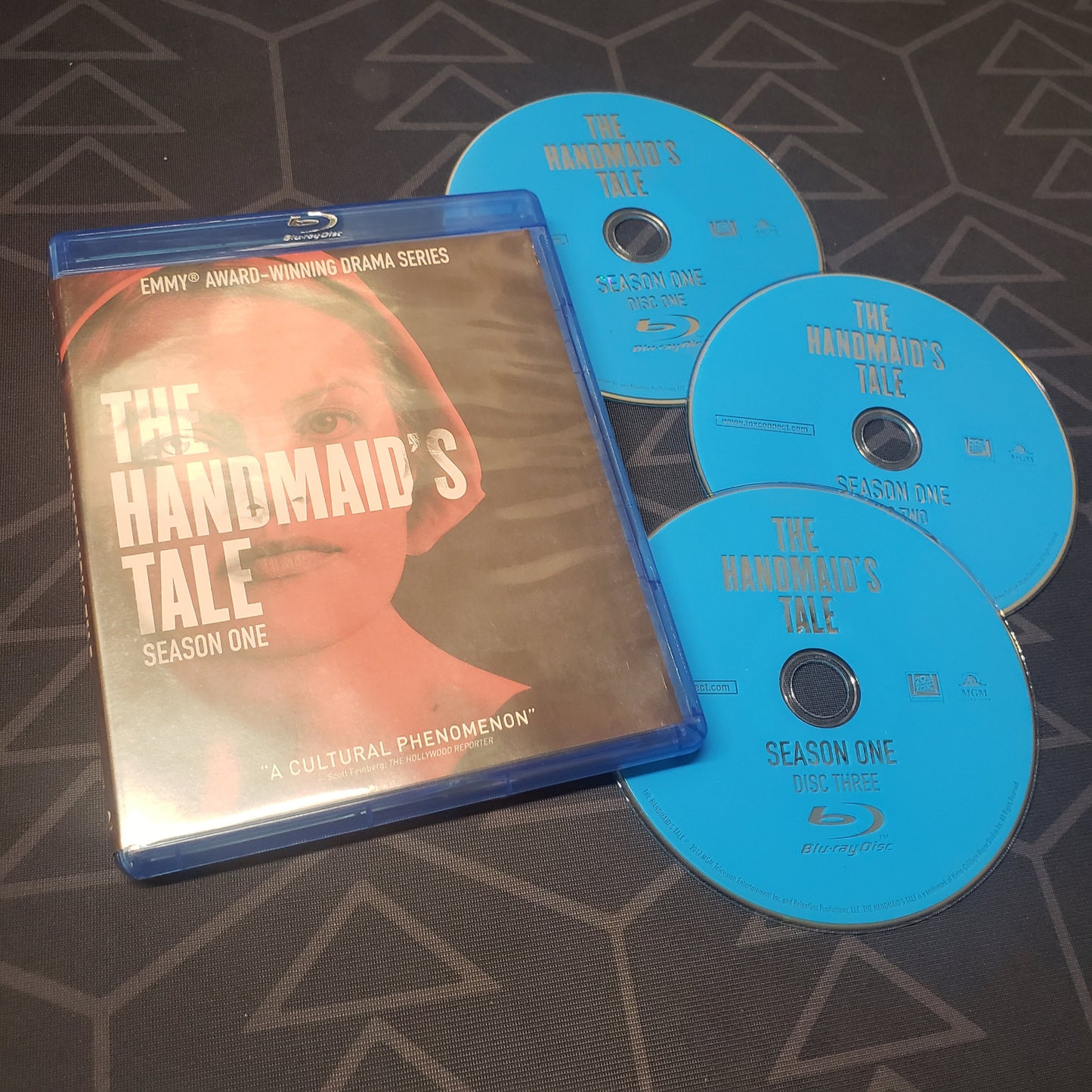Image shows the case & three discs for the first season of The Handmaid's Tale on Blu-Ray