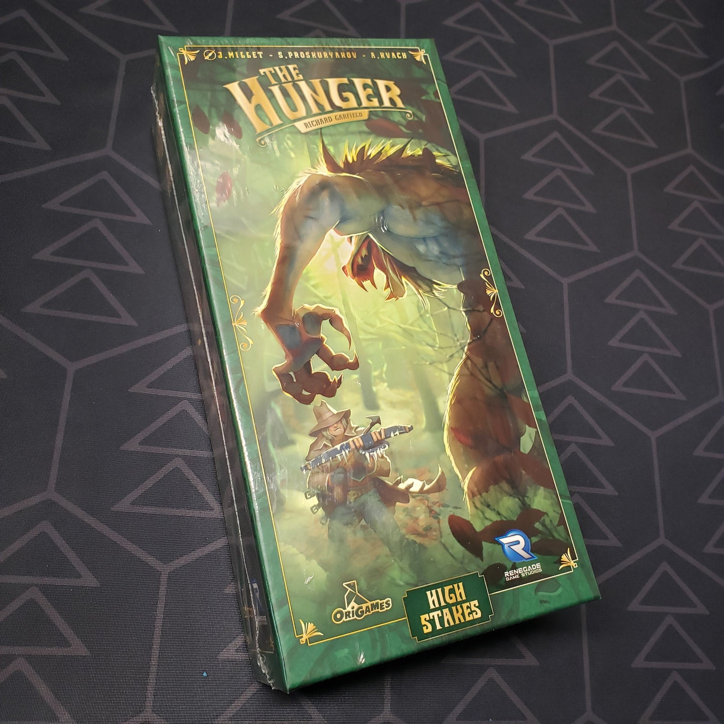 Image shows the front cover of the box of the High Stakes expansion for the board game The Hunger