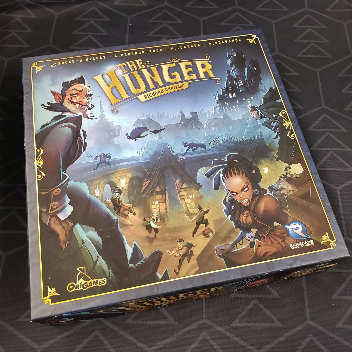 Image shows the front cover of the box of the Hunger board game