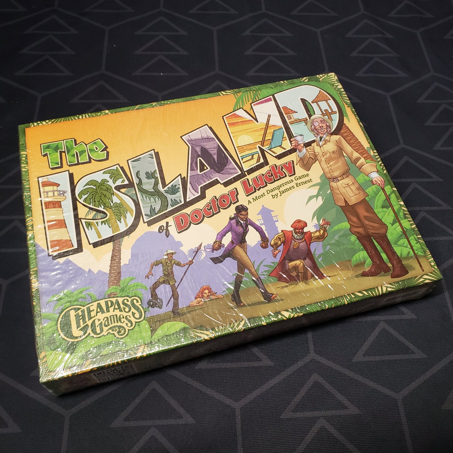 Image shows the front cover of the box for the Island of Doctor Lucky board game