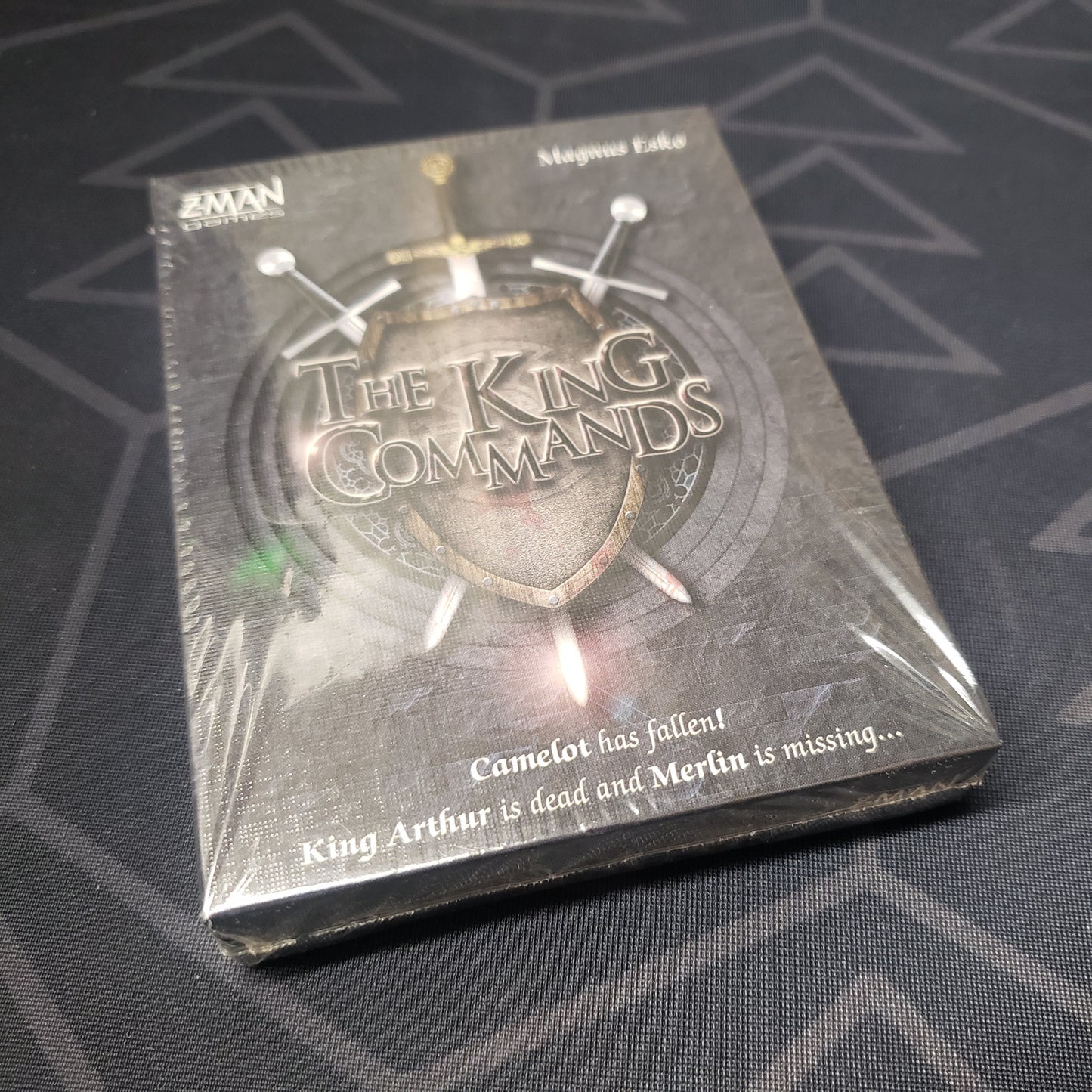 Image shows the front cover of the box of the King Commands card game