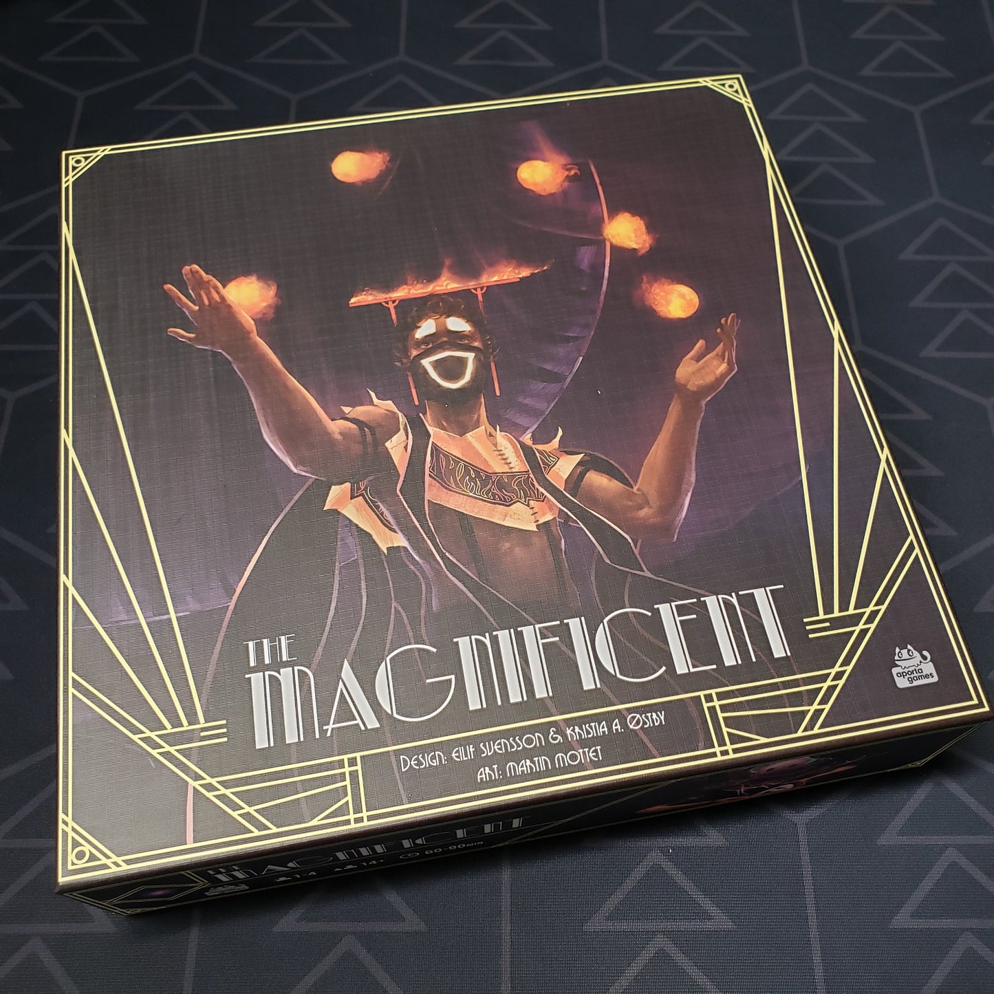 Image shows the front cover of the box of the Magnificent board game