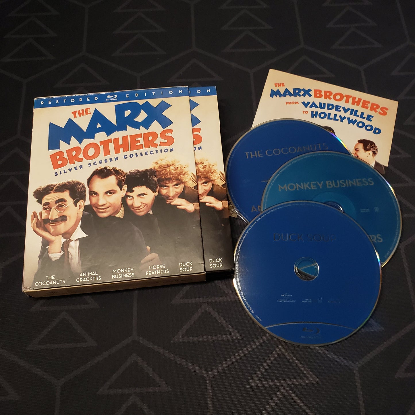 Image shows the case, insert, outer box & three discs for the movie set of The Marx Brothers: Silver Screen Collection on Blu-Ray