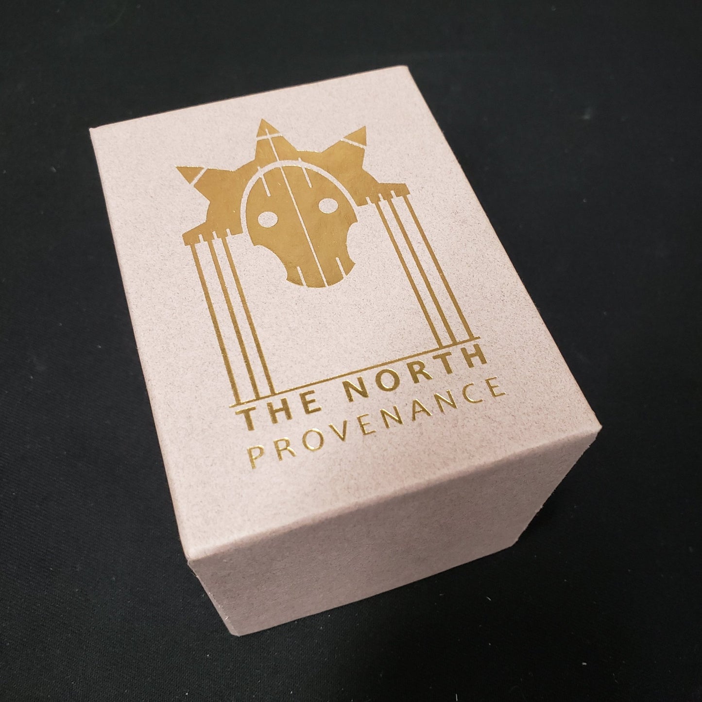 Image shows the front cover of the box of the North: Provenance card game