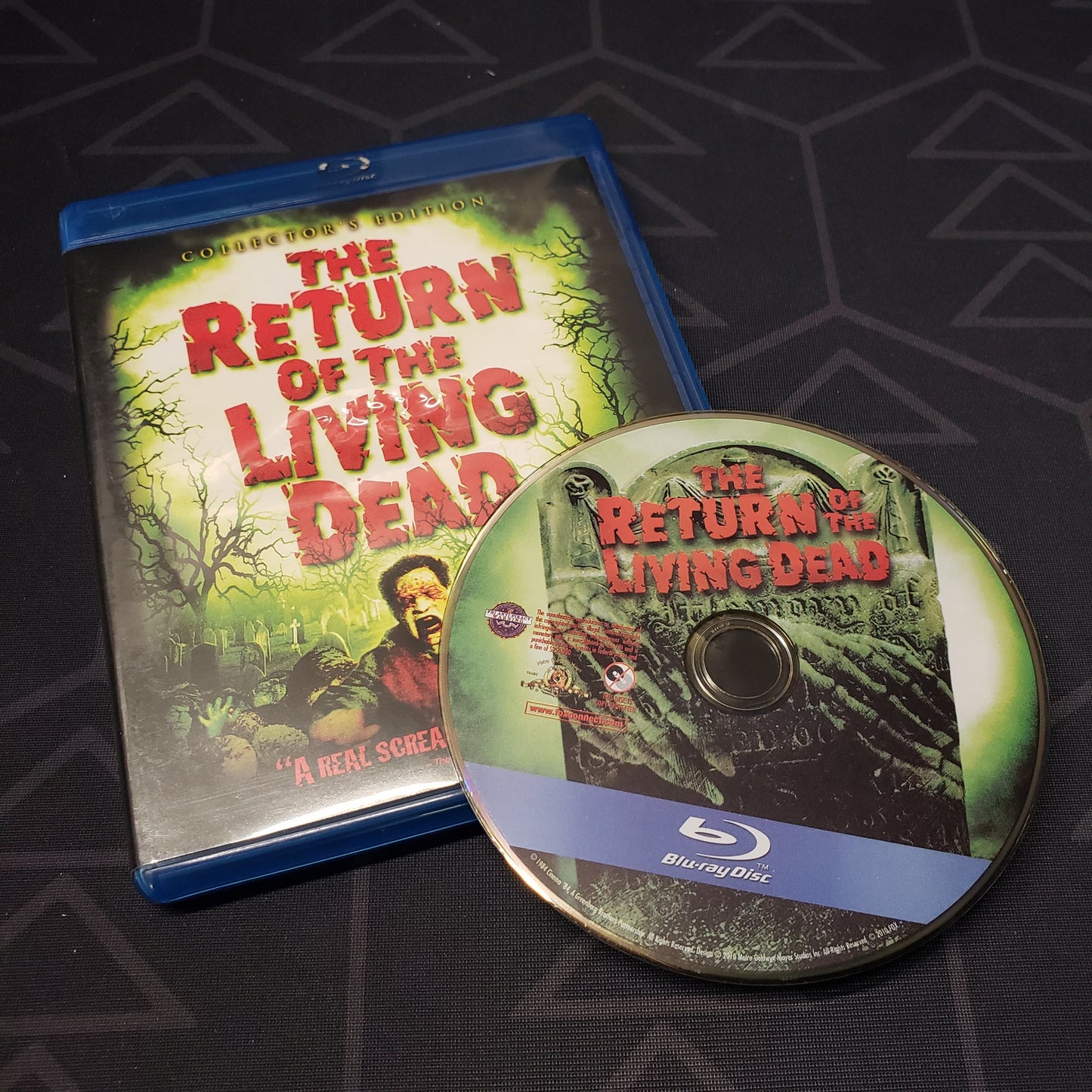 Image shows the case & disc for the movie The Return of the Living Dead: Collector's Edition on Blu-Ray