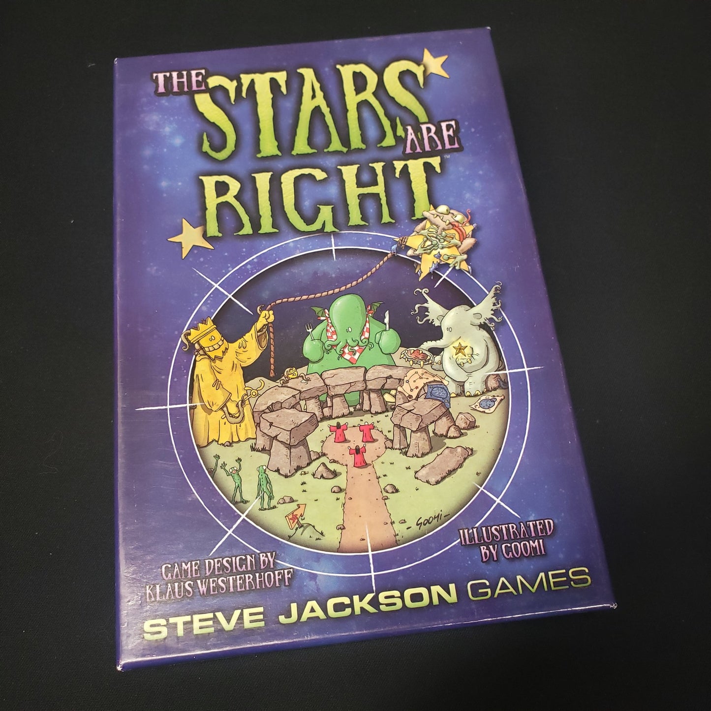 Image shows the front cover of the box of the Stars are Right card game
